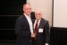 Dr. Nagib Callaos, General Chair, giving Dr. Robert Cherinka a award "In Appreciation for Delivering a Great Keynote Address at a Plenary Session."